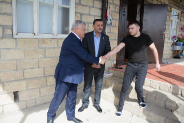 İcra başçısı Birinci Qarabağ müharibəsi əlili Rüstəm Əliyevi ziyarət edib