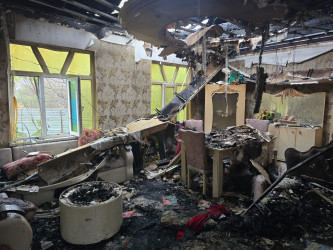 İcra başçısı Yuxarı Sarıcalı kəndində evi yanan ailəni ziyarət edib