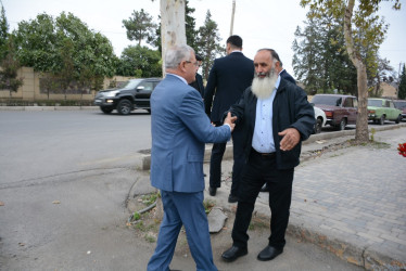 Rayon rəhbəri 27 sentyabr-Anım Gününün beşinci ildönümü ilə əlaqədar 3-cü dərəcəli “Vətənə xidmətə görə” ordenli şəhid Kənan Ağayevin ailə üzvləri ilə birlikdə onun adını daşıyan küçədə aparılan əsaslı təmir işləri ilə tanış olublar